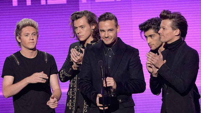 Niall Horan, Harry Styles, Liam Payne, Zayn Malik and Louis Tomlinson of One Direction speak onstage at the 2014 American Music Awards at Nokia Theatre L.A. Live on November 23, 2014 in Los Angeles, California. Lester Cohen/WireImage