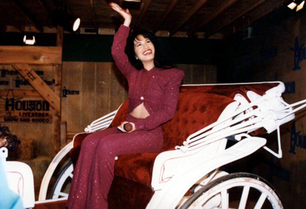 Selena Quintanilla-Perez, rides in a carriage during a performance at the Houston Livestock Show & Rodeo at the Houston Astrodome, Houston, Texas, February 26, 1995. The performance was her last before her murder the following month. Arlene Richie/Getty Images