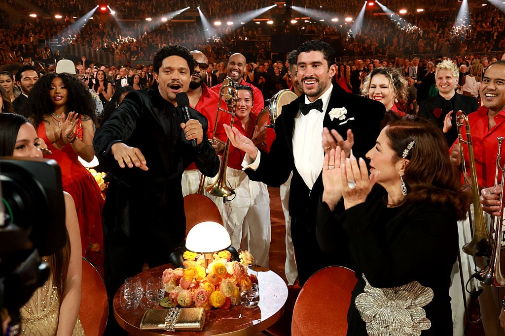 Trevor Noah and Bad Bunny speak onstage during the 68th GRAMMY Awards at Crypto.com Arena on February 01, 2026 in Los Angeles, California.