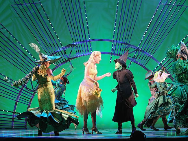 Actresses Cecilia de la Cueva and Danna Paola perform on stage during the musical ‘Wicked’. October 18, 2013. Victor Chavez/Getty.