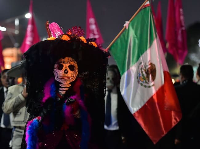 People dresseded as Catrinas and Catrines took to the historic center of Toluca to participate in the traditional of the Day of the Dead parade. Arturo Hernandez/Getty Images.