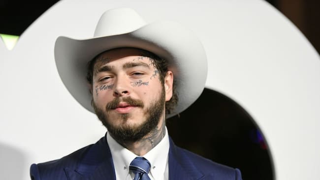 Post Malone arrives at the 2019 GQ Men Of The Year event at The West Hollywood Edition on December 05, 2019 in West Hollywood, California. Morgan Lieberman/FilmMagic