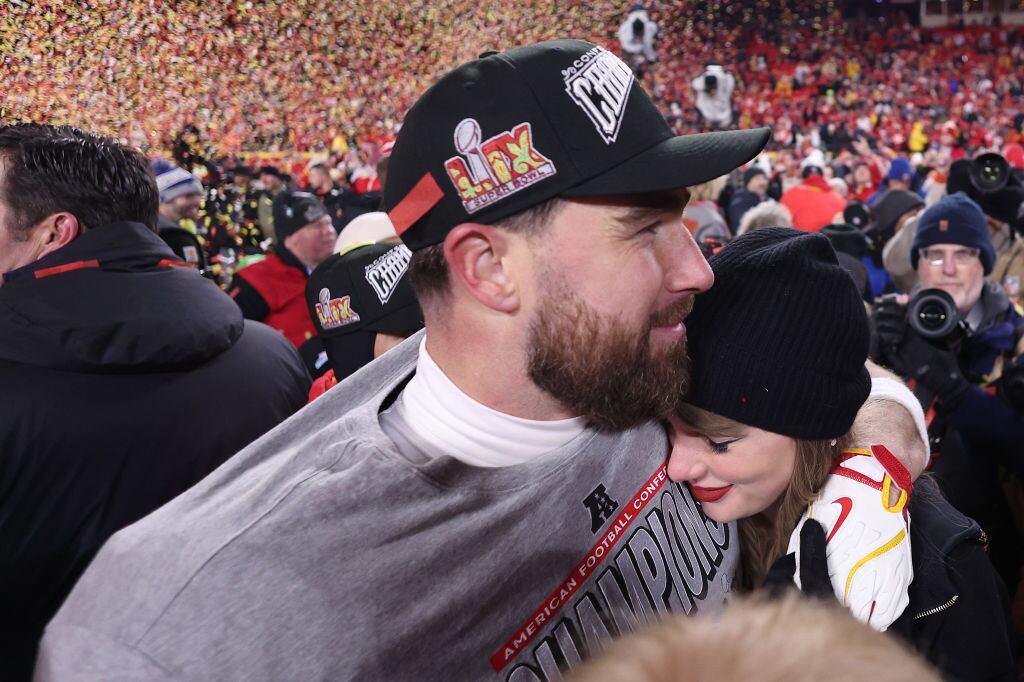 Taylor Swift celebrates with Travis Kelce #87 of the Kansas City Chiefs after defeating the Buffalo Bills 32-29 in the AFC Championship Game at GEHA Field at Arrowhead Stadium on January 26, 2025 in Kansas City, Missouri. Jamie Squire/Getty Images