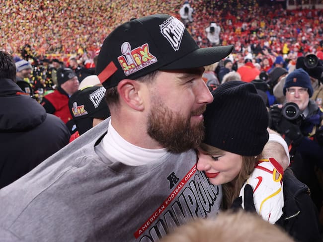 Taylor Swift celebrates with Travis Kelce #87 of the Kansas City Chiefs after defeating the Buffalo Bills 32-29 in the AFC Championship Game at GEHA Field at Arrowhead Stadium on January 26, 2025 in Kansas City, Missouri. Jamie Squire/Getty Images