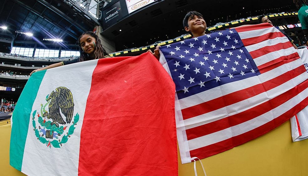 Fans hold the Mexican and American flags prior to the United States playing Mexico during the finals of the CONCACAF Gold Cup 2025 on July 06, 2025 in Houston, Texas. (Ron Jenkins/Getty Images)