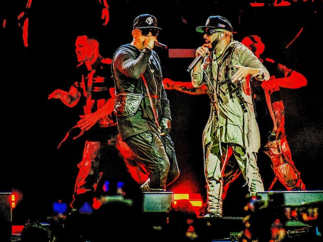 Wisin & Yandel perform during their «La Ultima Misión» Tour in Orlando, Florida. Gerardo Mora / Getty Images