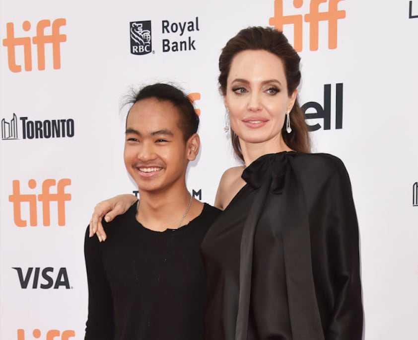 Maddox Jolie-Pitt and Angelina Jolie on September 11, 2017 in Toronto, Canada. Alberto E. Rodriguez/Getty Images.