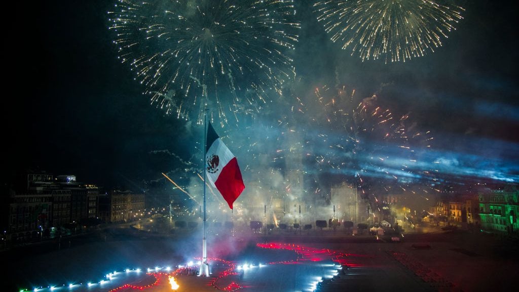 Fireworks go off over an empty Zocalo Square during the ceremony ‘The Shout’ (El Grito) marking the start of Independence Day celebrations in Mexico City on September 15, 2020. (Claudio Cruz/Getty Images)