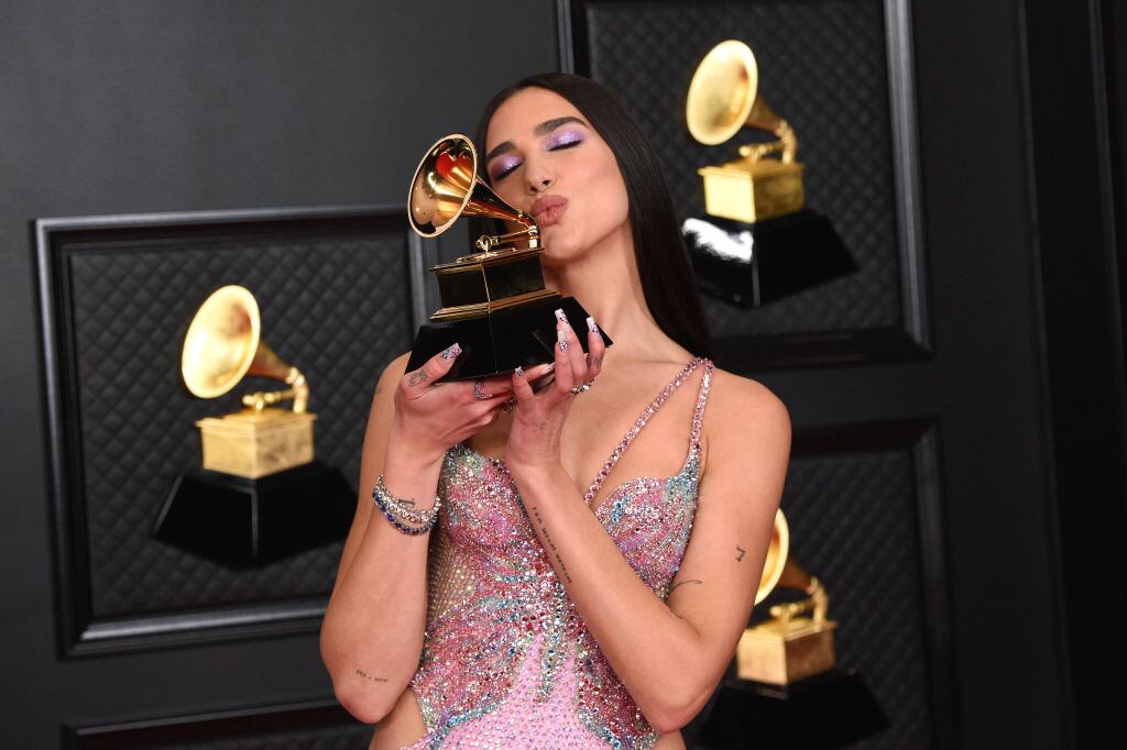 Dua Lipa, winner of Best Pop Vocal Album for ‘Future Nostalgia’, poses in the media room during the 63rd Annual GRAMMY Awards at Los Angeles Convention Center on March 14, 2021 in Los Angeles, California. Kevin Mazur/Getty Images for The Recording Academy