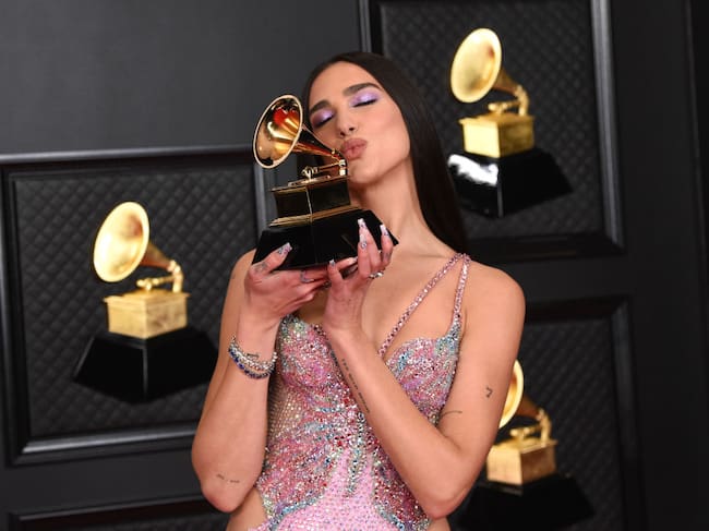 Dua Lipa, winner of Best Pop Vocal Album for ‘Future Nostalgia’, poses in the media room during the 63rd Annual GRAMMY Awards at Los Angeles Convention Center on March 14, 2021 in Los Angeles, California. Kevin Mazur/Getty Images for The Recording Academy