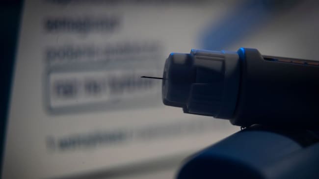 Ozempic needle injection pen. Jaap Arriens/Getty Images.