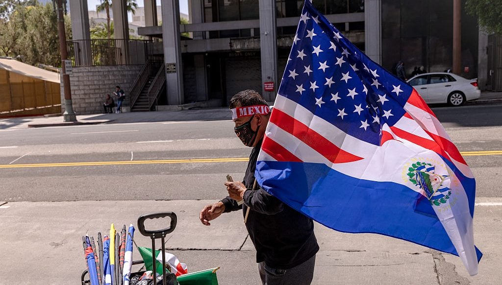 Hand seller sells flags of Mexico and the US as protesters continue anti-ICE demonstrations on the second day in Los Angeles, California, on June 7, 2025. (Sahab Zaribaf/Getty Images)