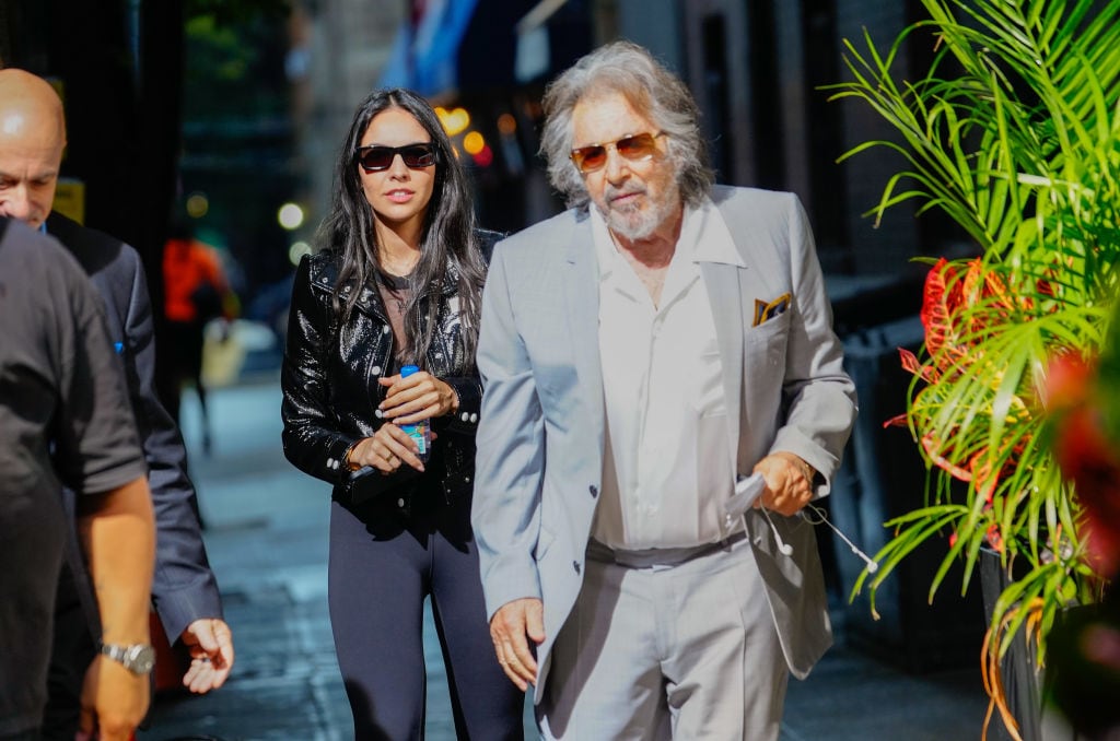 Noor Alfallah and Al Pacino arrive for a music video shoot with Bad Bunny on August 24, 2023 in New York City. Gotham/GC Images