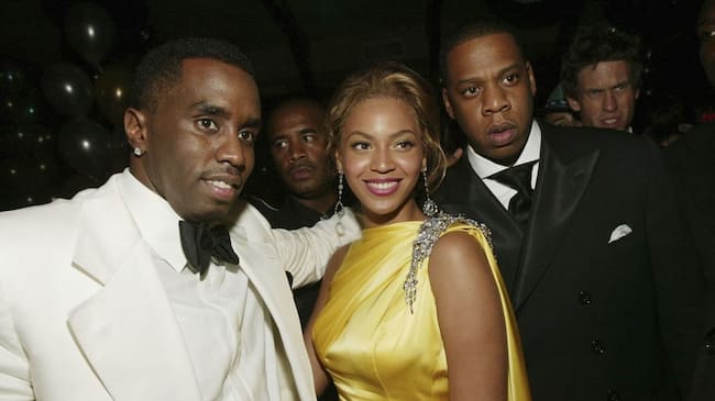Sean «P. Diddy» Combs and singers Beyonce Knowles and Jay-Z attend the Sean Jean/Zac Posen CFDA after-party at Marquee, on June 7, 2004 in New York City. Evan Agostini/Getty Images