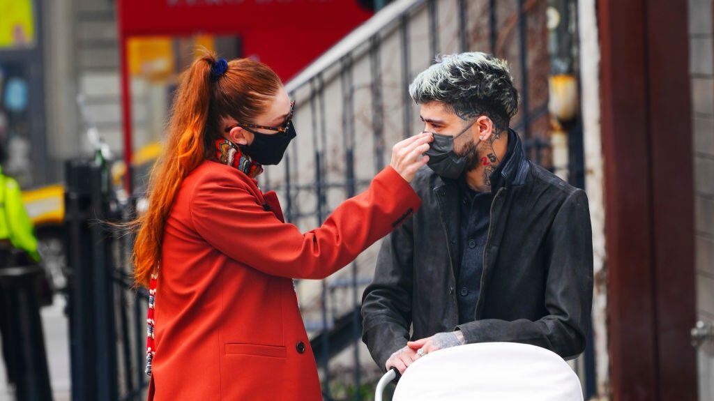 Gigi Hadid and Zayn Malik take baby Khai on a walk to lunch at The Smile on March 25, 2021 in New York City. Gotham/GC Images