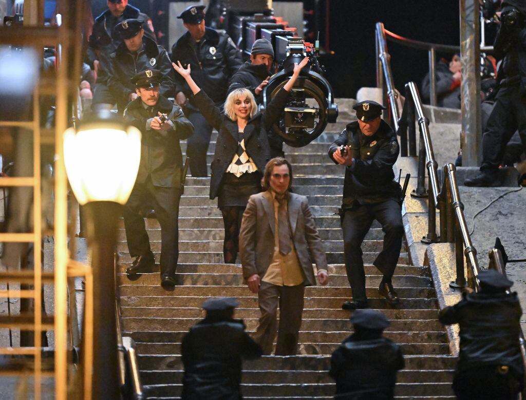 Lady Gaga and Joaquin Phoenix on the set of «Joker: Folie a Deux» in the Bronx, New York City. James Devaney/Getty Images.
