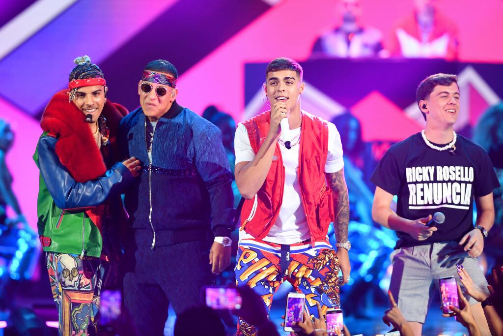 Rauw Alejandro, Daddy Yankee, Lunay and Guaynaa perform together on stage during Premios Juventud 2019 in Florida.  Jason Koerner / Getty Images