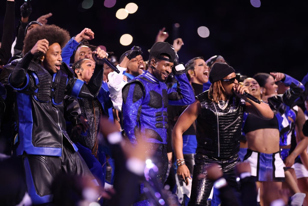LAS VEGAS, NEVADA – FEBRUARY 11: (L-R) Ludacris, Usher, and Lil Jon perform onstage during the Apple Music Super Bowl LVIII Halftime Show at Allegiant Stadium on February 11, 2024 in Las Vegas, Nevada. (Photo by Ezra Shaw/Getty Images)