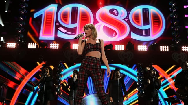 Taylor Swift performs during iHeartRadio Jingle Ball 2014. Kevin Kane/Getty Images.