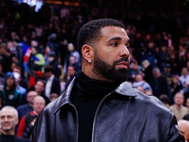 Drake leaves the court following the NBA game between the Toronto Raptors and the Golden State Warriors at Scotiabank Arena on January 13, 2025 in Toronto, Canada. NOTE TO USER: User expressly acknowledges and agrees that, by downloading and or using this photograph, User is consenting to the terms and conditions of the Getty Images License Agreement. Cole Burston/Getty Images