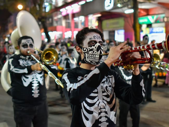 People dresseded as Catrinas and Catrines took to the historic center of Toluca to participate in the traditional of the Day of the Dead parade. Arturo Hernandez/Getty Images.