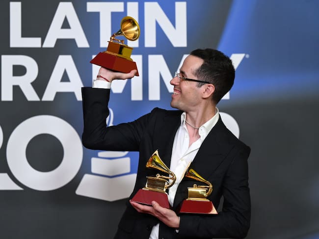 Edgar Barrera poses with the awards for Best regional song, Songwriter of the year and Producer of the year during The 24th Annual Latin Grammy Awards on November 16, 2023 in Seville, Spain. (Photo by Borja B. Hojas/Getty Images for Latin Recording Academy)