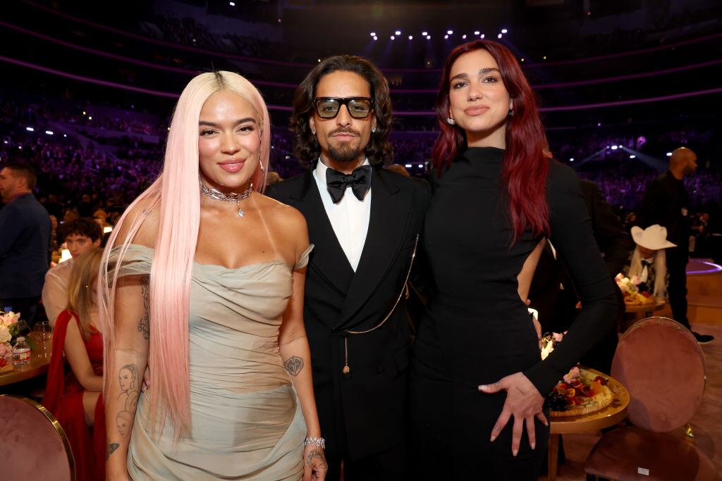 Karol G, Maluma and Dua Lipa attend the 66th GRAMMY Awards at Crypto.com Arena on February 04, 2024 in Los Angeles, California. Kevin Mazur/Getty Images for The Recording Academy