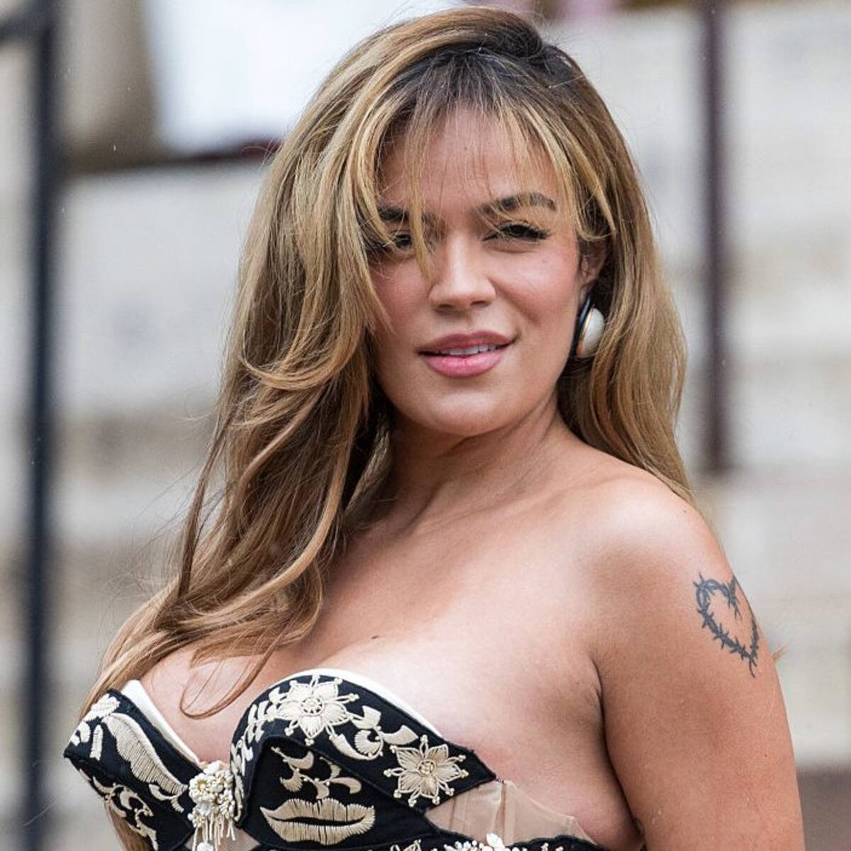 Karol G’s Media Snub at Paris Fashion Week Highlights a Bigger Problem: Are Latin Artists Still Underestimated?