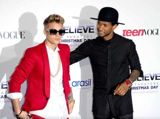 Justin Bieber and Usher attend the premiere of Open Road Films’ ‘Justin Bieber’s Believe’ at Regal Cinemas L.A. Live on December 18, 2013 in Los Angeles, California. Allen Berezovsky/Getty Images