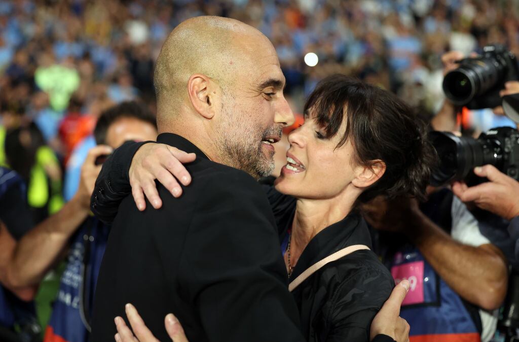 Manchester City manager Pep Guardiola’s kisses his wife Cristina Serra after winning the UEFA Champions League 2022/23 final match between FC Internazionale and Manchester City FC at Ataturk Olympic Stadium on June 10, 2023 in Istanbul, Turkey. Ian MacNicol/Getty Images