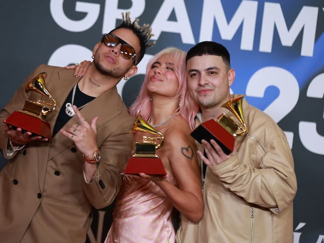 Ovy On The Drums, Karol G, and Kevyn Mauricio Cruz pose with the awards for Best Album of the Year, in the media center for The 24th Annual Latin Grammy Awards at FIBES Conference and Exhibition Centre on November 16, 2023 in Seville, Spain. (Photo by Patricia J. Garcinuno/WireImage)
