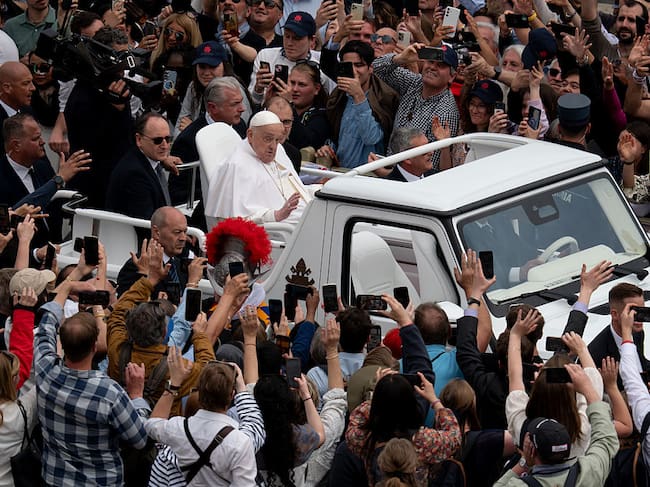 Pope Francis greets the faithful at the end of the Easter Mass celebrated by Cardinal Angelo Comastri to commemorate the resurrection of Jesus at the Vatican on April 20, 2025. Massimo Valicchia/NurPhoto via Getty Images