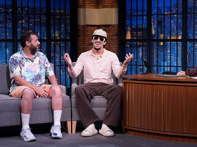 Adam Sandler and rapper Bad Bunny during an interview with host Seth Meyers July 22, 2025 (Lloyd Bishop/NBC via Getty Images)
