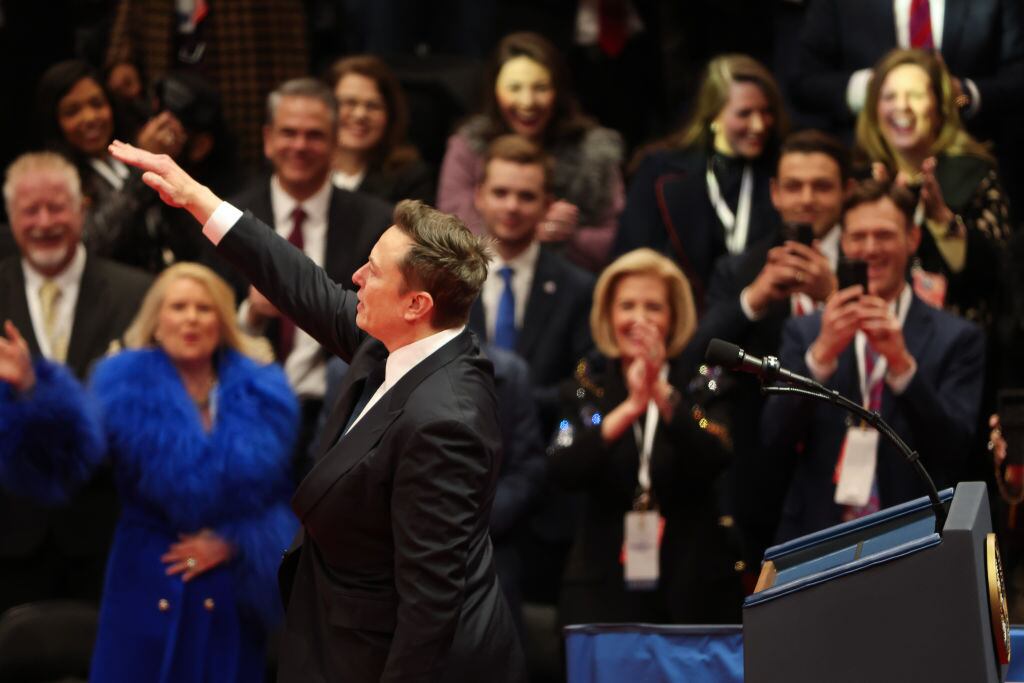 Elon Musk gestures while speaking during an inauguration event at Capital One Arena on January 20, 2025 in Washington, DC. Donald Trump takes office for his second term as the 47th president of the United States. Justin Sullivan/Getty Images