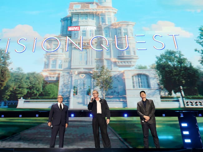 ANAHEIM, CALIFORNIA - AUGUST 14: (L-R) James Spader, Paul Bettany, and Kevin Feige, President, Marvel Studios, speak onstage at the Disney Entertainment Showcase at D23: The Ultimate Disney Fan Event on August 14, 2026 in Anaheim, California. (Photo by Kevin Mazur/Getty Images for Disney)