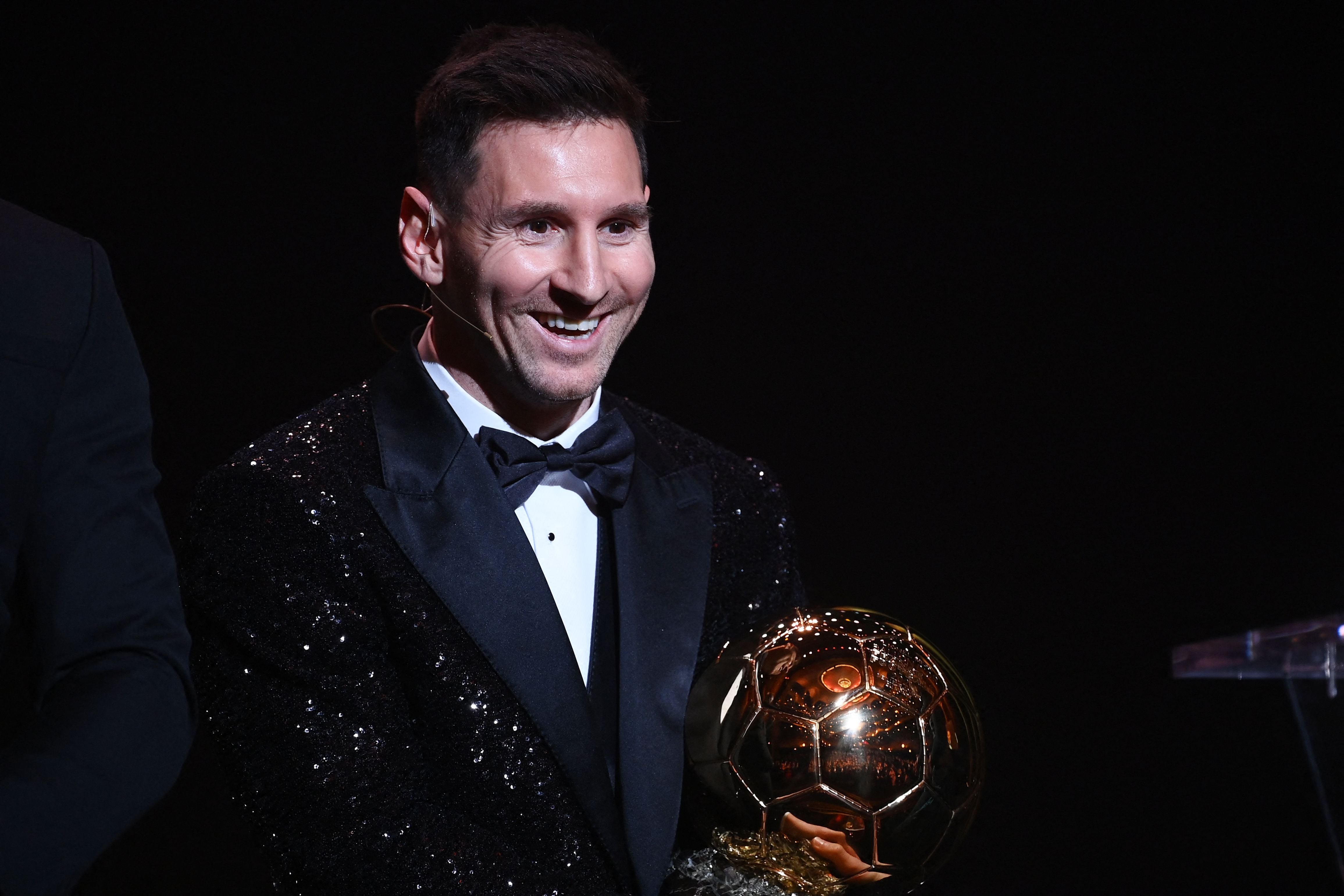 Paris Saint-Germain's Argentine forward Lionel Messi poses after being awarded the the Ballon d'Or award during the 2021 Ballon d'Or France Football award ceremony at the Theatre du Chatelet in Paris on November 29, 2021. (Photo by FRANCK FIFE / AFP) (Photo by FRANCK FIFE/AFP via Getty Images)