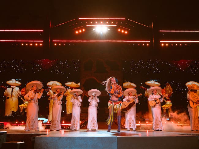 Karol G durante las primeras fechas de su Tropicoqueta Tour (julio de 2026) en el Soldier Field de Chicago, Estados Unidos