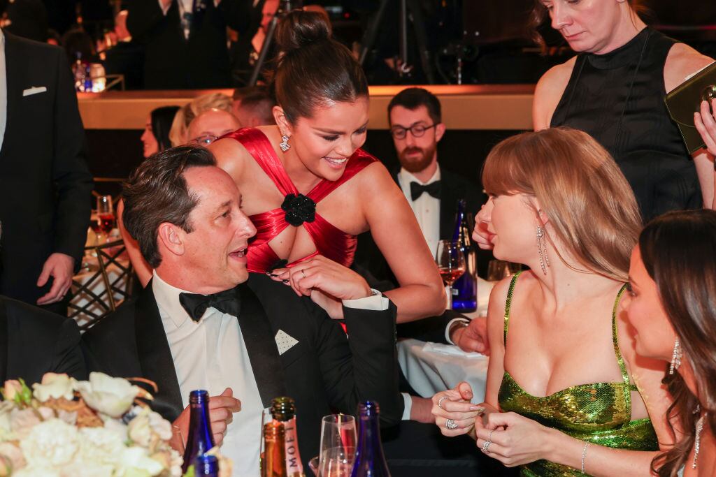David Greenbaum, Selena Gomez and Taylor Swift at the 81st Golden Globe Awards held at the Beverly Hilton Hotel on January 7, 2024 in Beverly Hills, California. Christopher Polk/Golden Globes 2024/Golden Globes 2024 via Getty Images