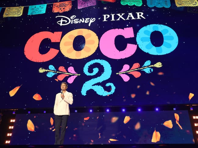 ANAHEIM, CALIFORNIA - AUGUST 14: Benjamin Bratt speaks onstage at the Disney Entertainment Showcase at D23: The Ultimate Disney Fan Event on August 14, 2026 in Anaheim, California. (Photo by Kevin Mazur/Getty Images for Disney)