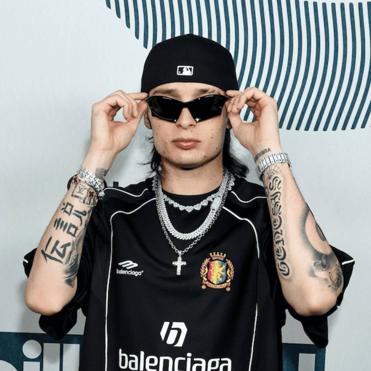 Peso Pluma’s Tattoos: A Glimpse Into His History & Meaning