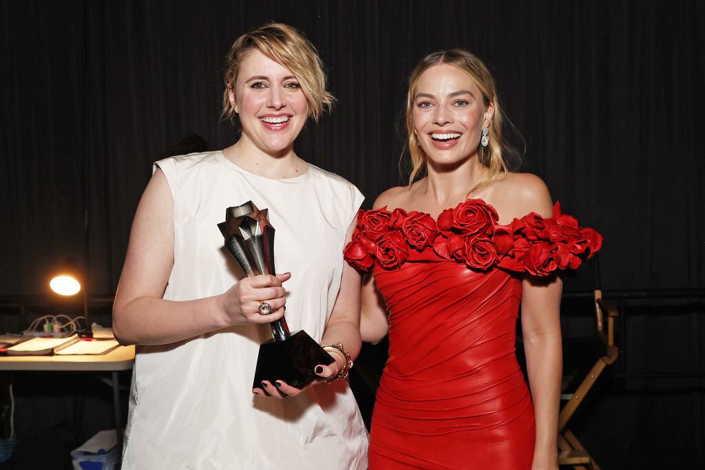 Greta Gerwig and Margot Robbie, winners of the Best Comedy Award for ‘Barbie,’ pose backstage during the 29th Annual Critics Choice Awards 2024 in Santa Monica, California. Kevin Mazur / Getty Images for Critics Choice Association