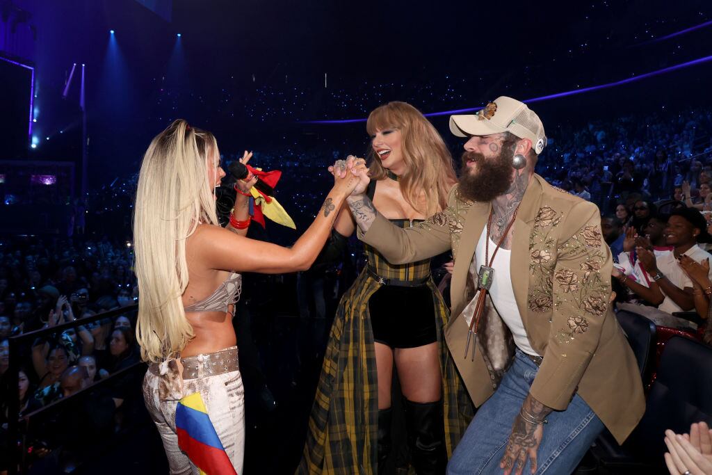 Karol G, Taylor Swift and Post Malone attend the 2024 MTV Video Music Awards at UBS Arena on September 11, 2024 in Elmont, New York. Johnny Nunez/Getty Images for MTV