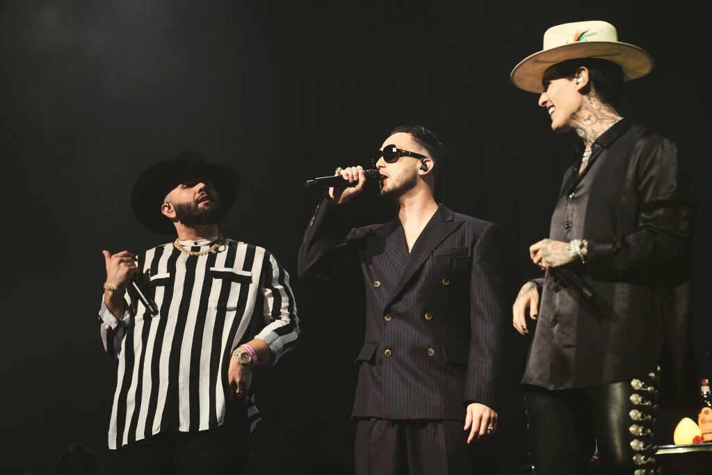 Carin Leon, Spanish rapper C. Tangana and Mexican singer Adriel Favela perform on stage at Wizink Center in Madrid. Mariano Regidor / Getty Images.