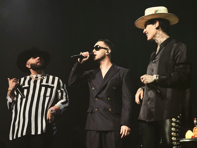 Carin Leon, Spanish rapper C. Tangana and Mexican singer Adriel Favela perform on stage at Wizink Center in Madrid. Mariano Regidor / Getty Images.