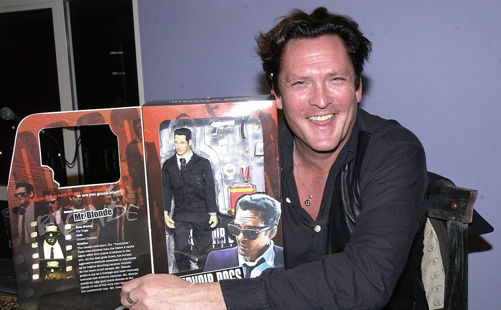 Michael Madsen poses with his action figure, Mr. Blond from <em>Reservoir Dogs</em> (Photo by Albert L. Ortega/WireImage)