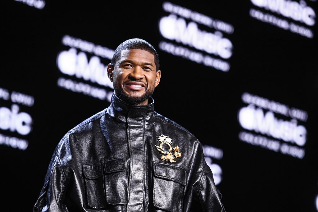 Usher speaks on stage during the Apple Music Super Bowl LVIII Halftime Show Press Conference held at The Mandalay Bay Convention Center in Las Vegas, Nevada. Picture date: Thursday February 8, 2024. PA Wire/PA Images via Getty Images