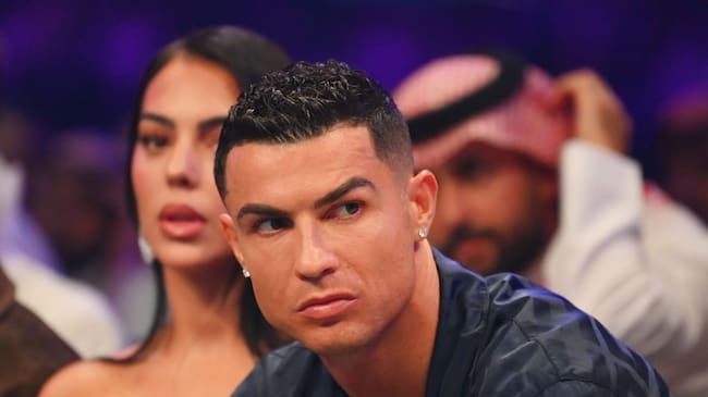 Cristiano Ronaldo looks on from ringside prior to the Heavyweight fight between Tyson Fury and Francis Ngannou at Boulevard Hall on October 28, 2023 in Riyadh, Saudi Arabia. (Photo by Justin Setterfield/Getty Images)