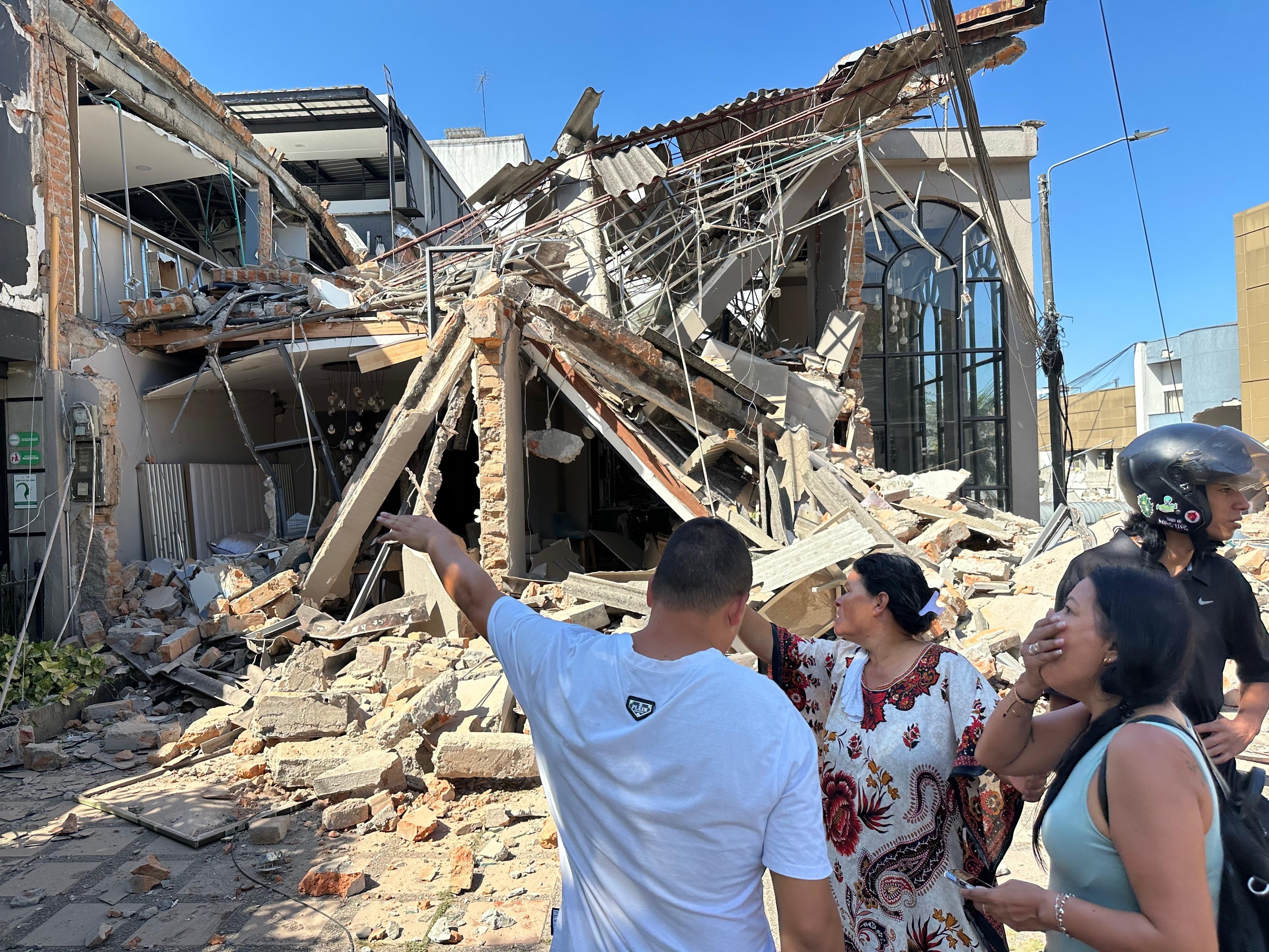 PEREIRA, COLOMBIA - AUGUST 10: People gather in the streets after a powerful earthquake struck Colombia, killing at least 18 people and causing damage in Pereira, Colombia, on August 10, 2026. The earthquake was felt across much of the country, with authorities continuing to assess the extent of the damage and possible additional casualties. (Photo by Alexis Munera/Anadolu via Getty Images)