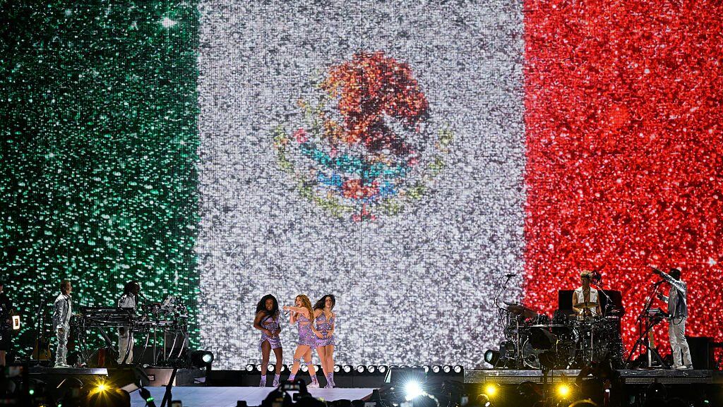 Shakira performs in front of a screen with the image of the Mexican flag during her ‘Las Mujeres Ya No Lloran World Tour’ at GNP Stadium in Mexico City on August 26, 2025. (Alfredo Estrella/Getty Images)