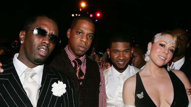 P. Diddy, Jay-Z, Usher, and Mariah Carey at Usher’s 26th birthday party. Frank Micelotta.